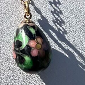 Floral, ceramic bead pendant on gold metal chain